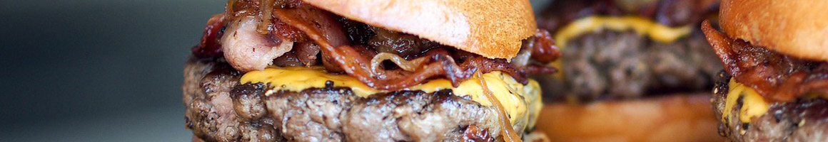Eating American (New) Burger at Hamburger Mary's restaurant in Los Angeles, CA.